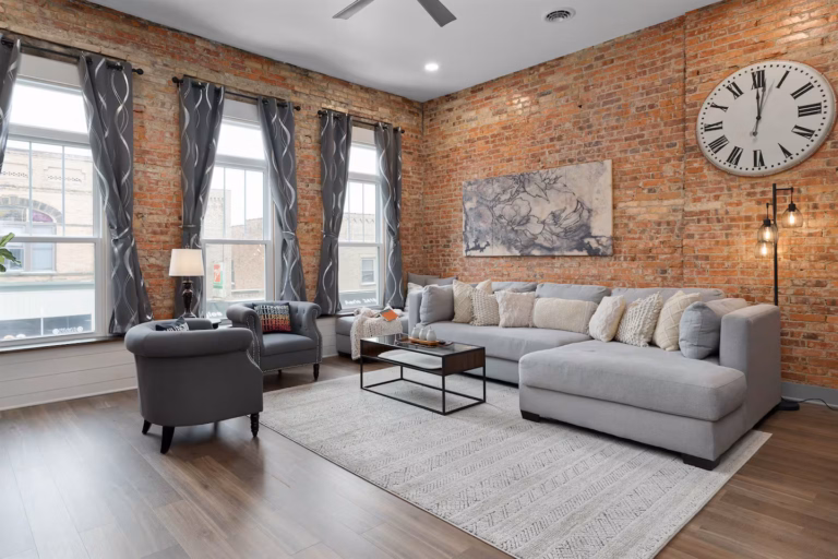 Three, 7.5' tall windows to give a great view of Historic Downtown Millersburg. The beautiful draperies offer black out with a noise absorbing core. Close them for a darker, quieter space.