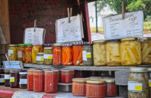 Colorful jars of assorted canned vegetables