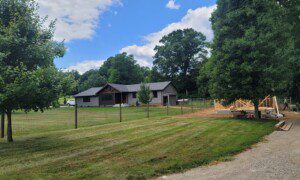 Psithurism House under construction beside the Croskey family home in Holmes County, Ohio