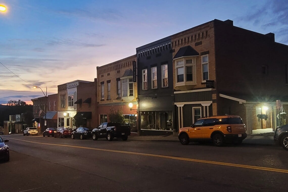 Historic downtown Millersburg, Ohio storefronts along Jackson Street in autumn