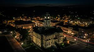 The Holmes County Courthouse lit up in downtown Millersburg, Ohio at night
